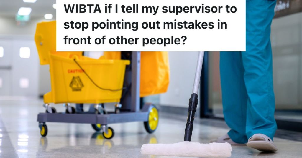 janitor using mop to clean floor