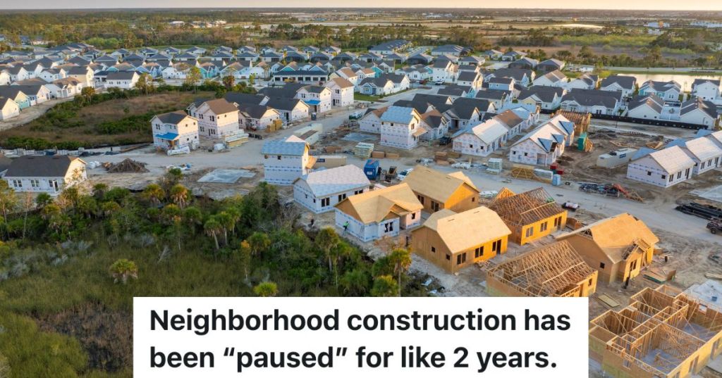 neighborhood with houses in various stages of construction