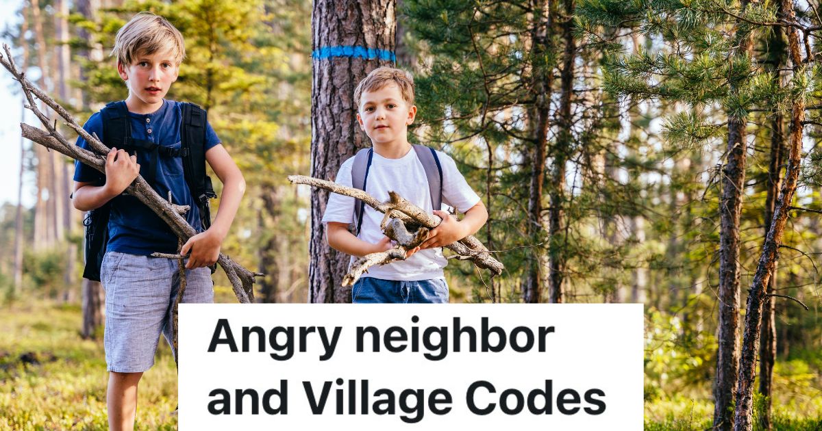 two boys carrying sticks