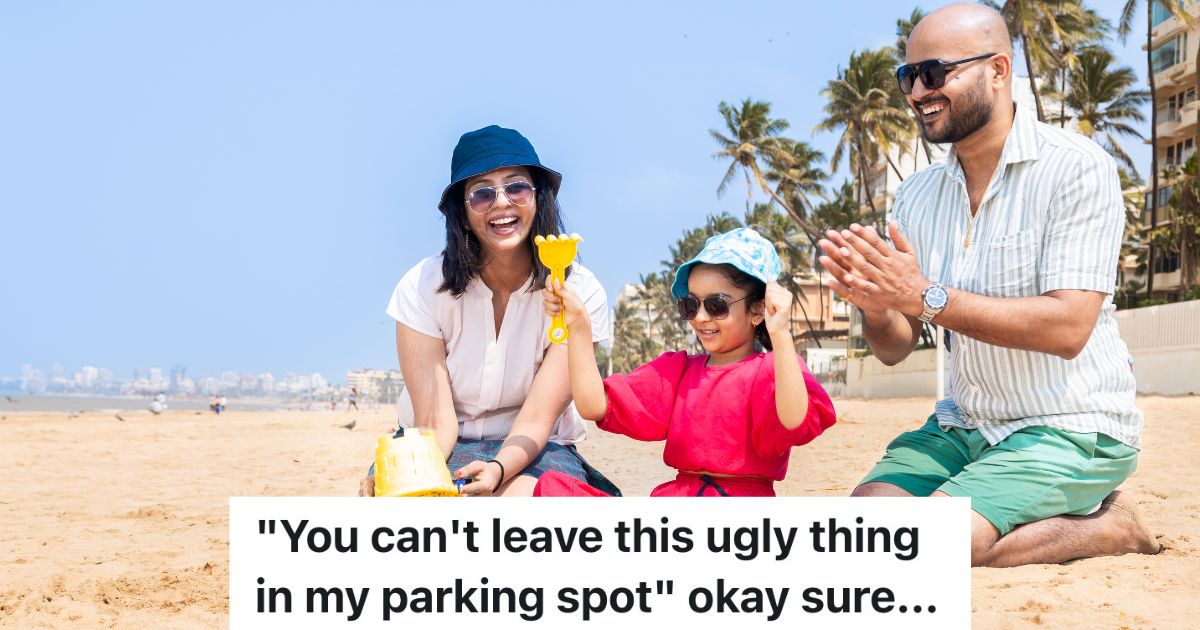 mom, dad and child playing on the beach
