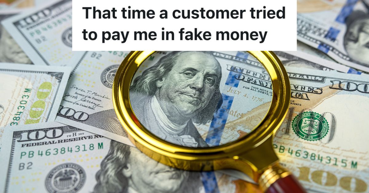 magnifying glass over a pile of $100 bills