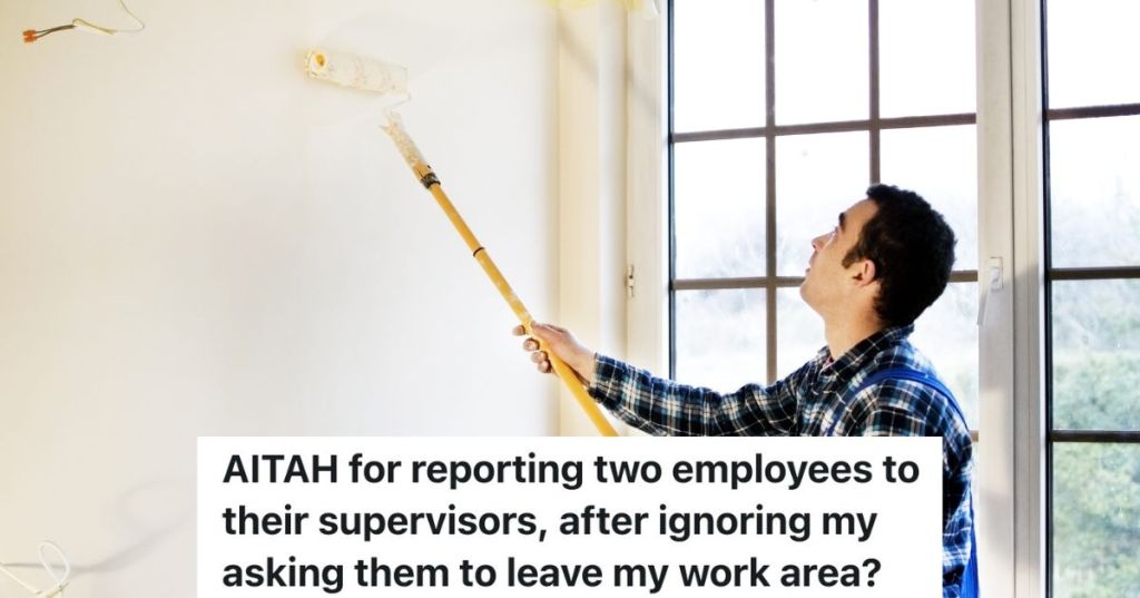 man painting wall with paint roller