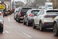 Annoying Driver Tried To Cut Through Traffic Around Road Construction, But Other Drivers Blocked The Move