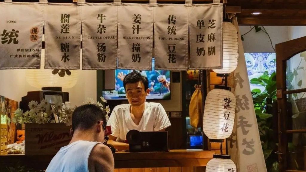 Manager of Asian restaurant dealing with angry customer