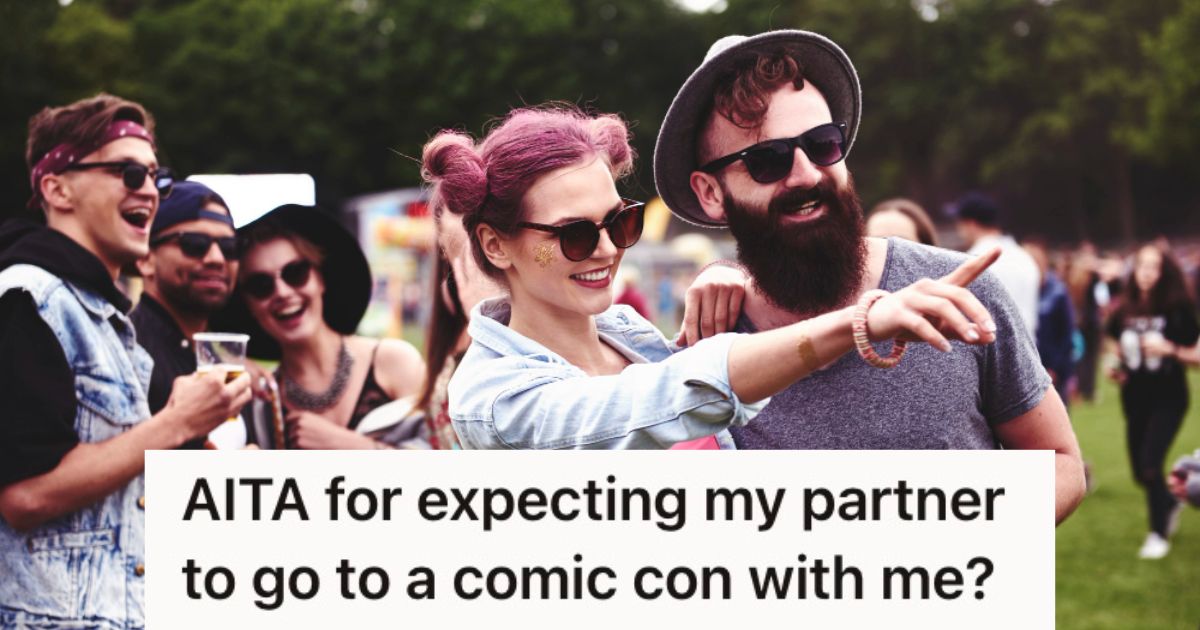 Man and woman enjoying an outdoor festival with other people