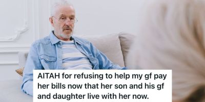 Old man talking to a woman about a serious matter