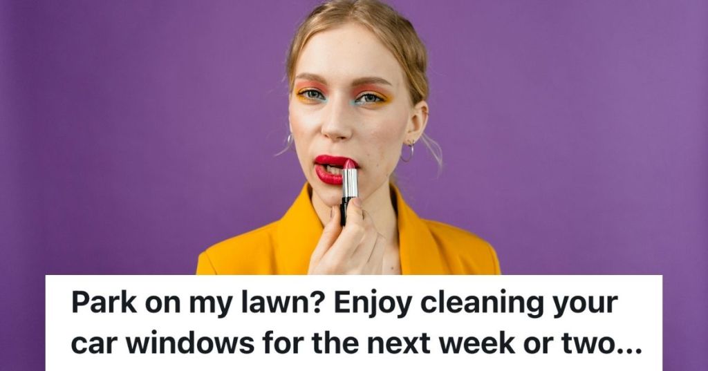 Woman applying red lipstick