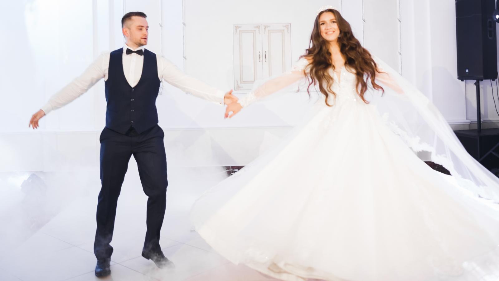 bride and groom dancing