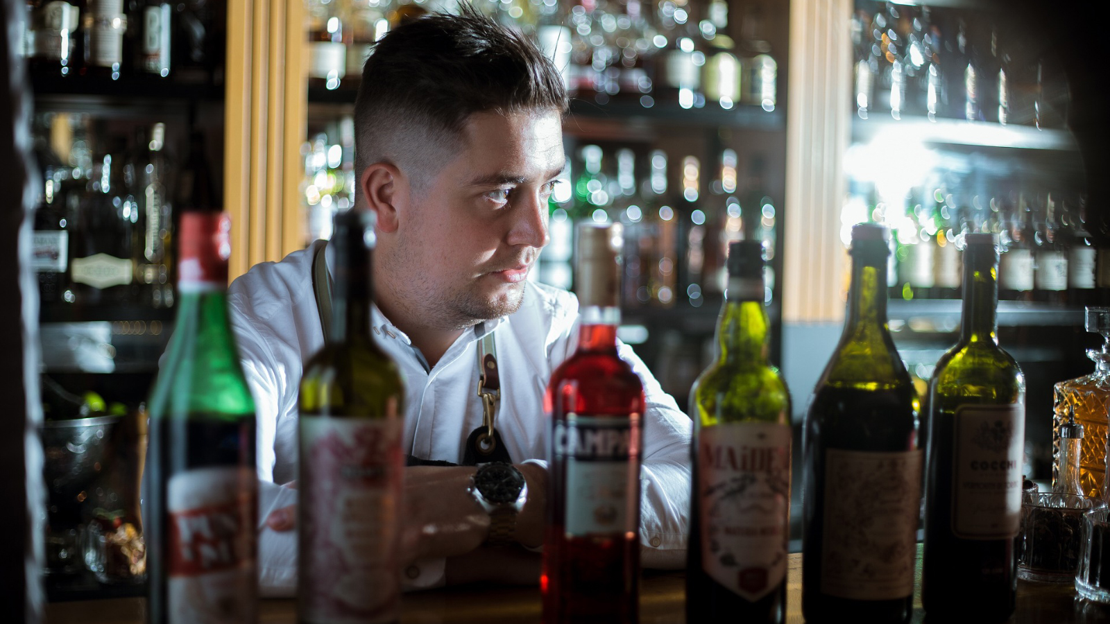 An upset looking bartender