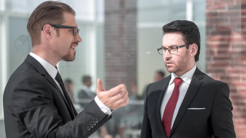 two men talking business