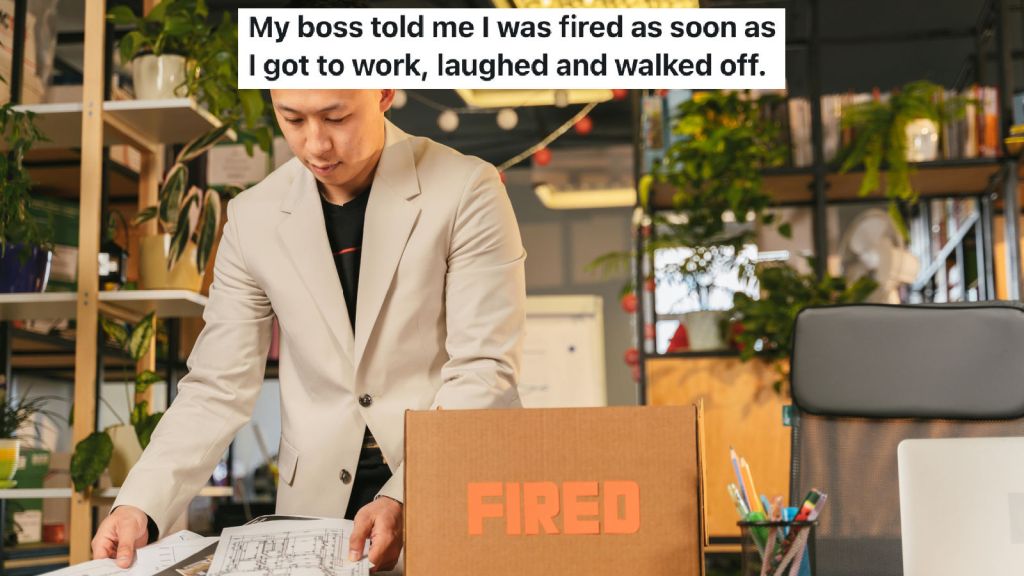 man packing up a box after being fired