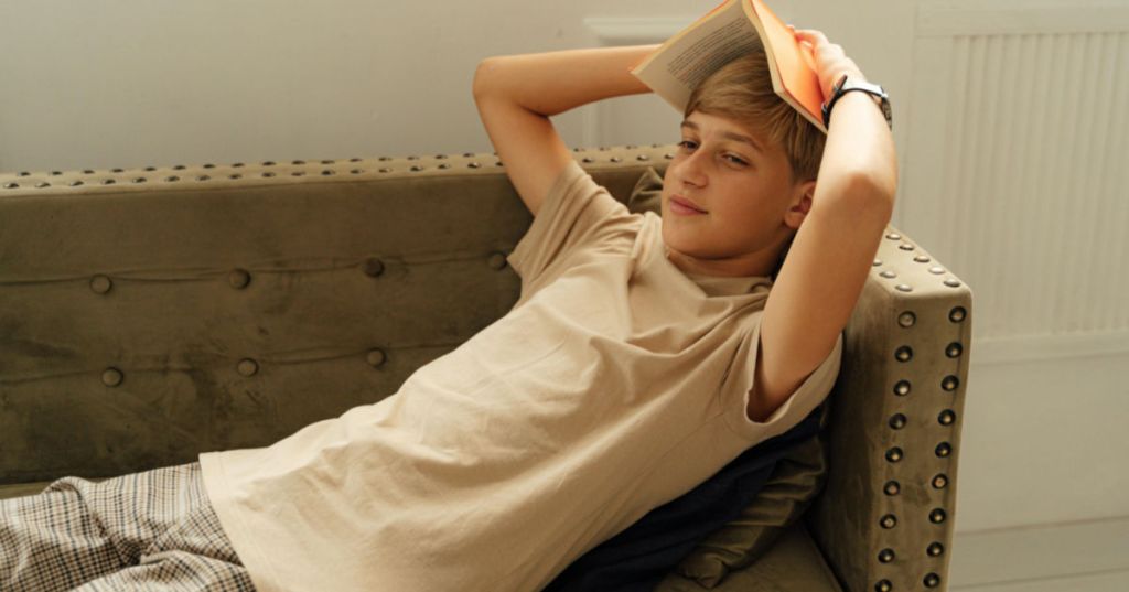tired teen boy