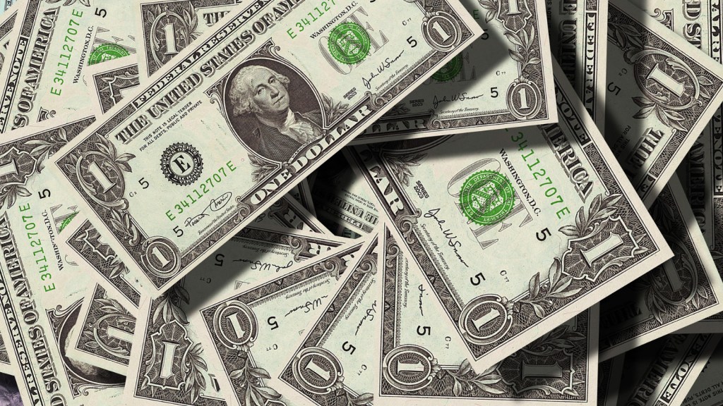 A pile of one dollar bills