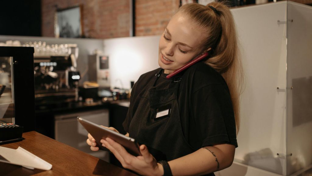 cashier talking on phone