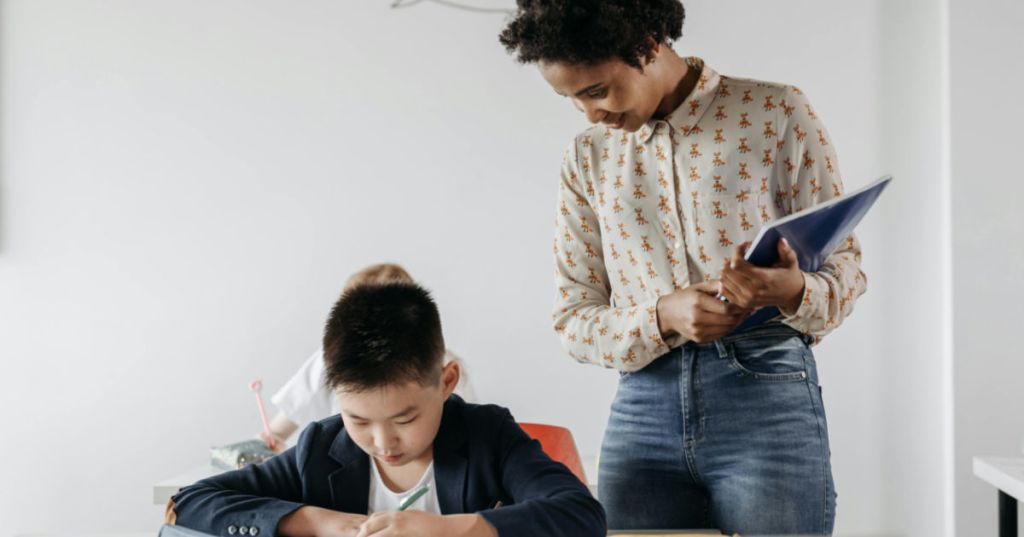 librarian teaching a student