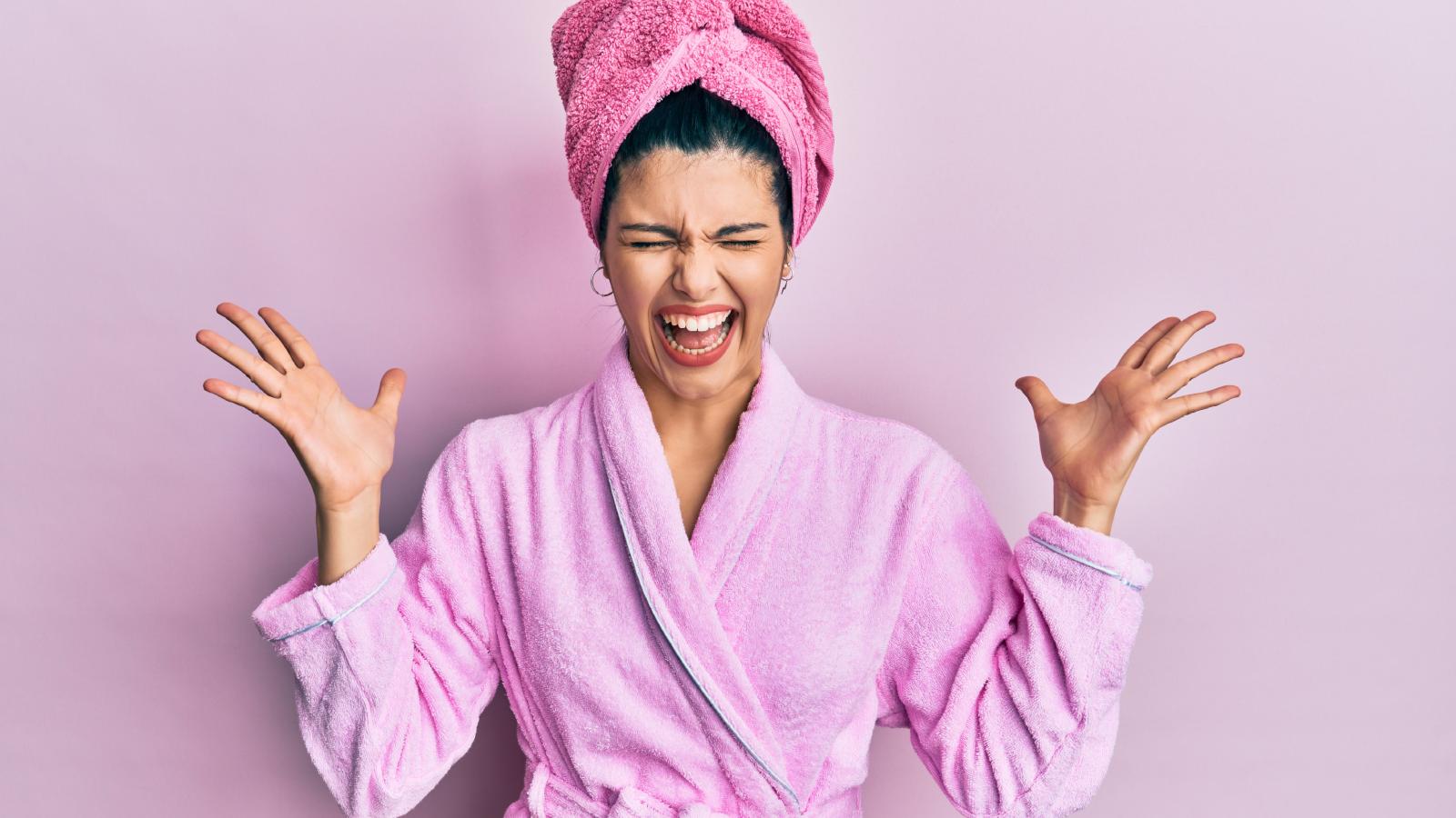 The Bathroom Counter Crisis: How a Realistic Fake Insect Triggered a Morning Meltdown Between Spouses woman yelling in a bathrobe