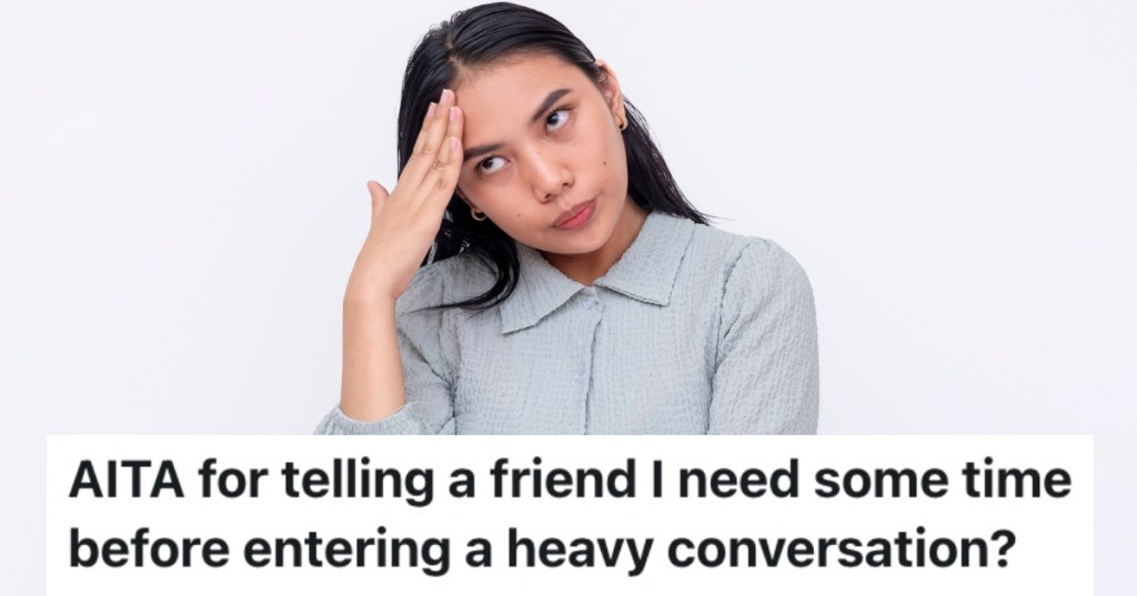 woman holding her head