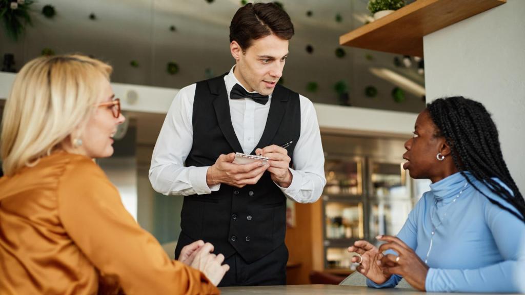 man waiting on a table