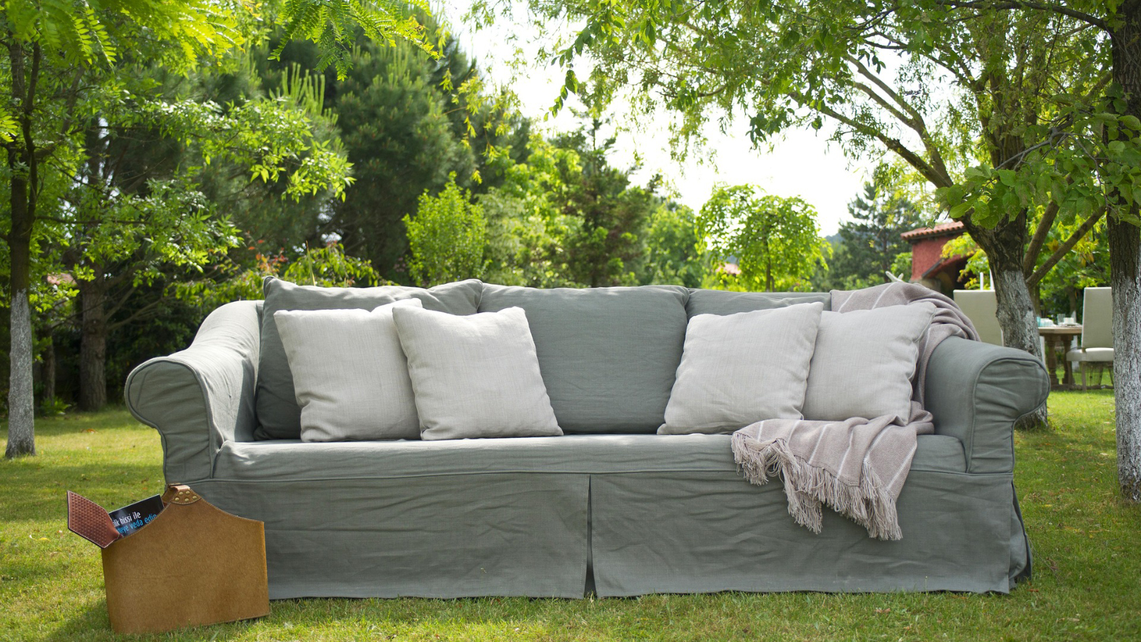 Paranoid Neighbors Free Furniture Scheme Sends Waves of Strangers to Woman’s House A couch on a lawn
