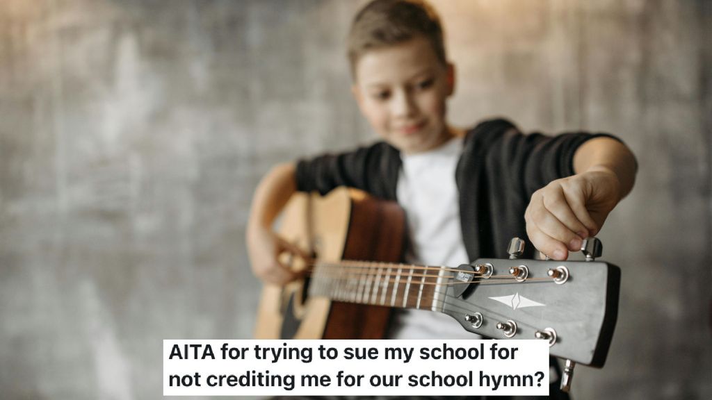 boy playing the guitar