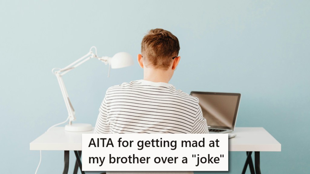 Back of a teenage boy sitting at a desk