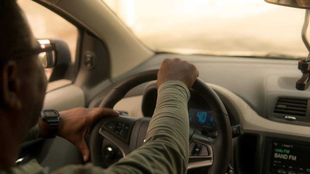 A man driving a car