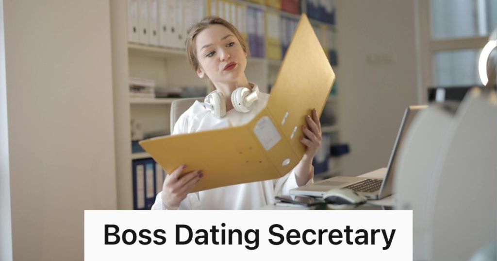 female secretary holding yellow binder