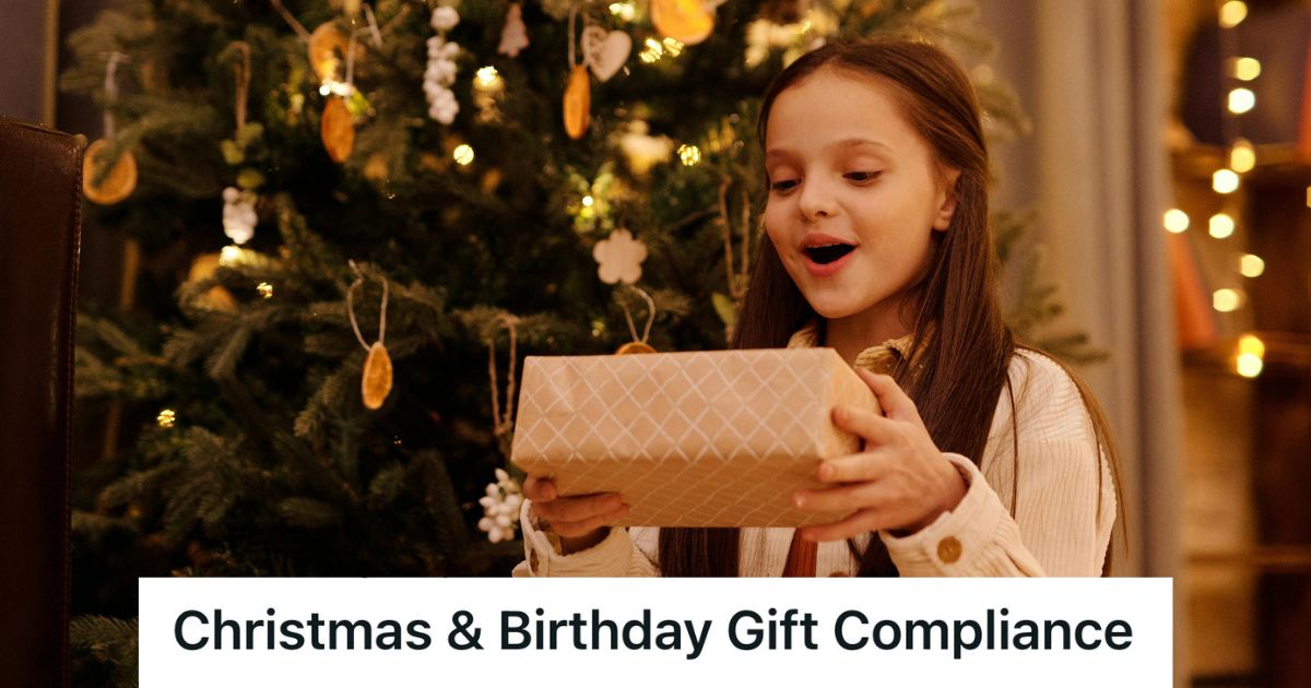 girl opening a christmas present