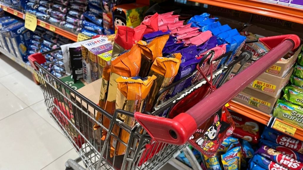grocery cart full of cookies