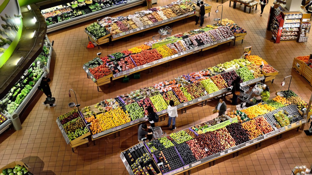 An overhead view of produce at a grocery store