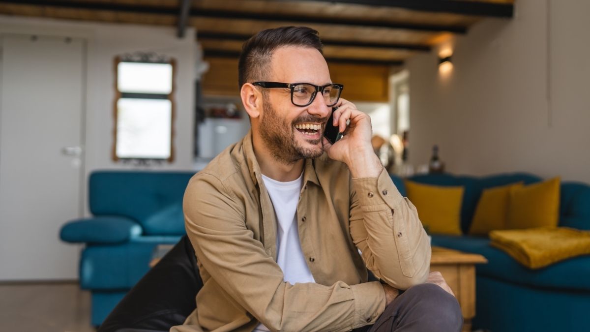 laughing man on the phone