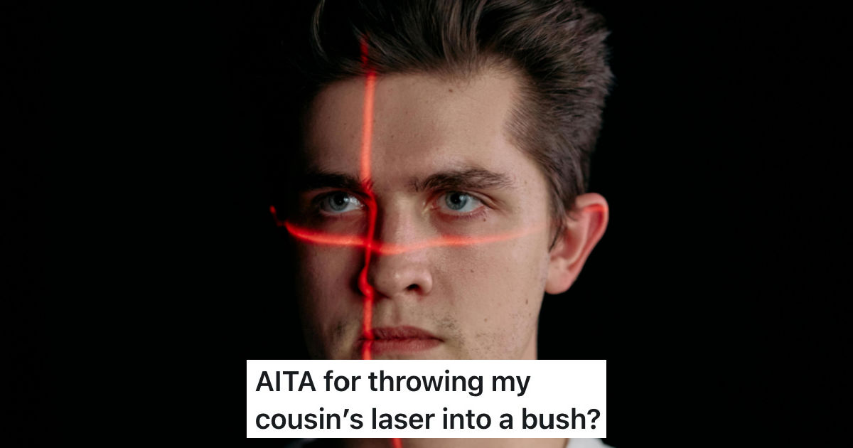 man with red laser on his face