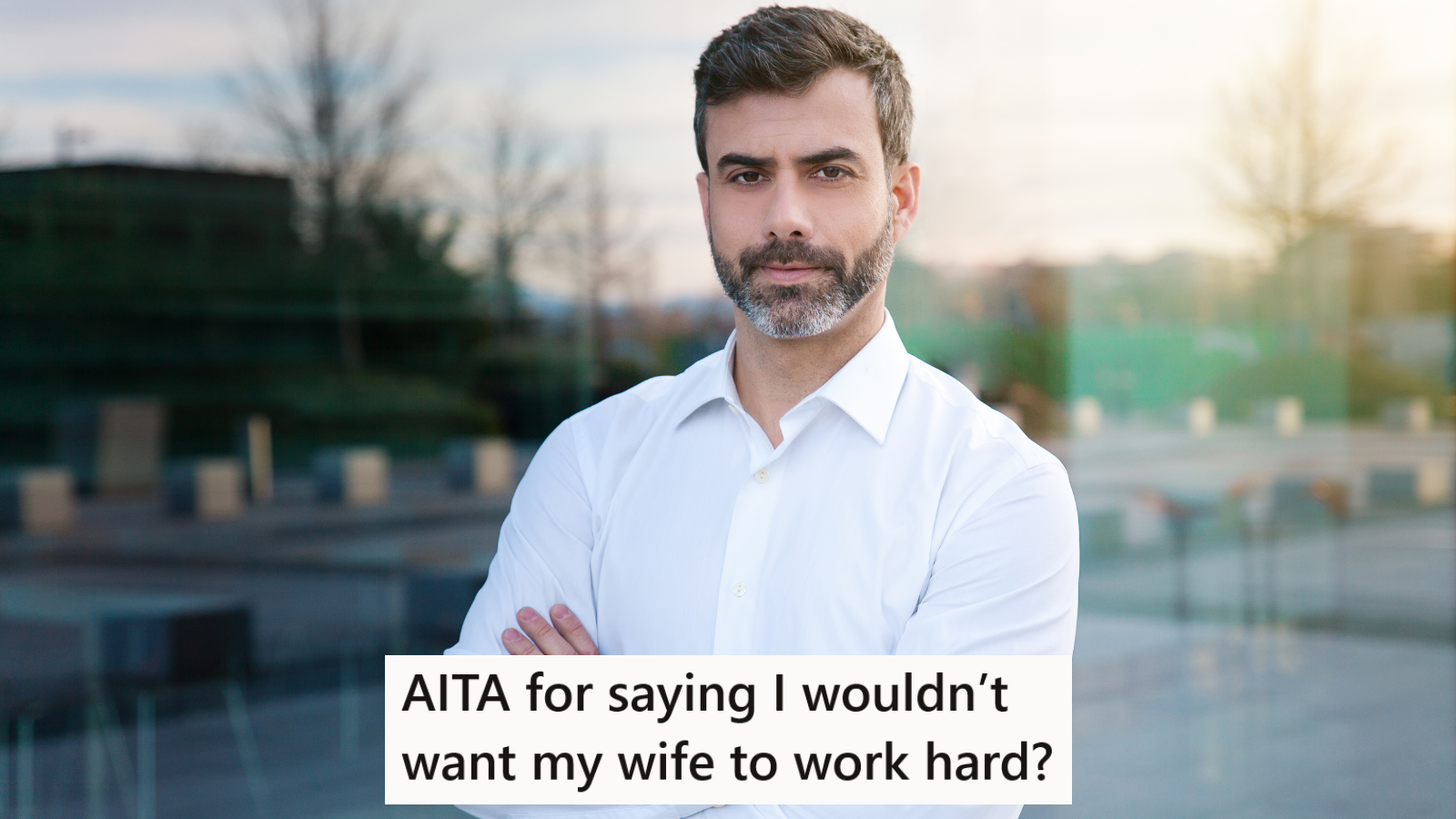 A businessman with his arms crossed