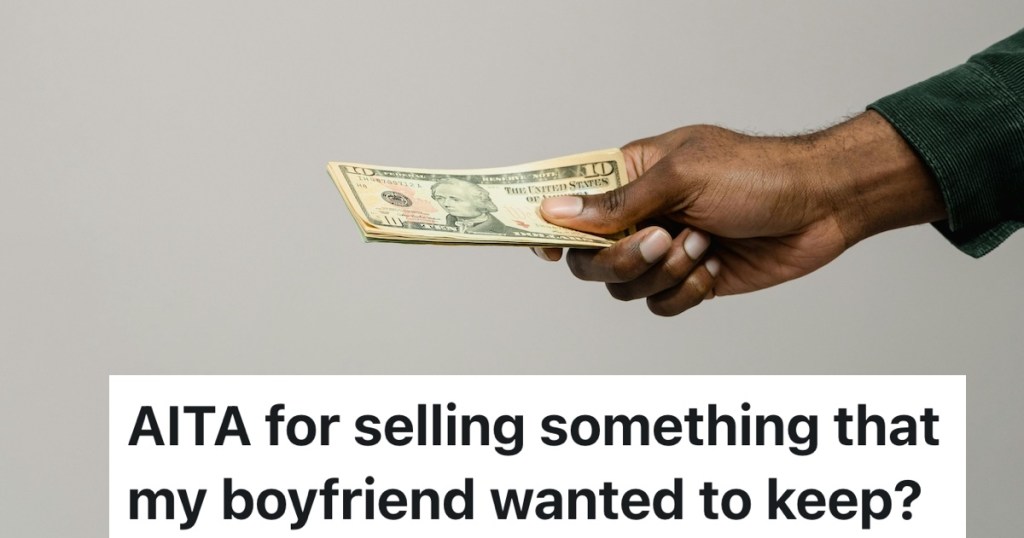 person holding out cash