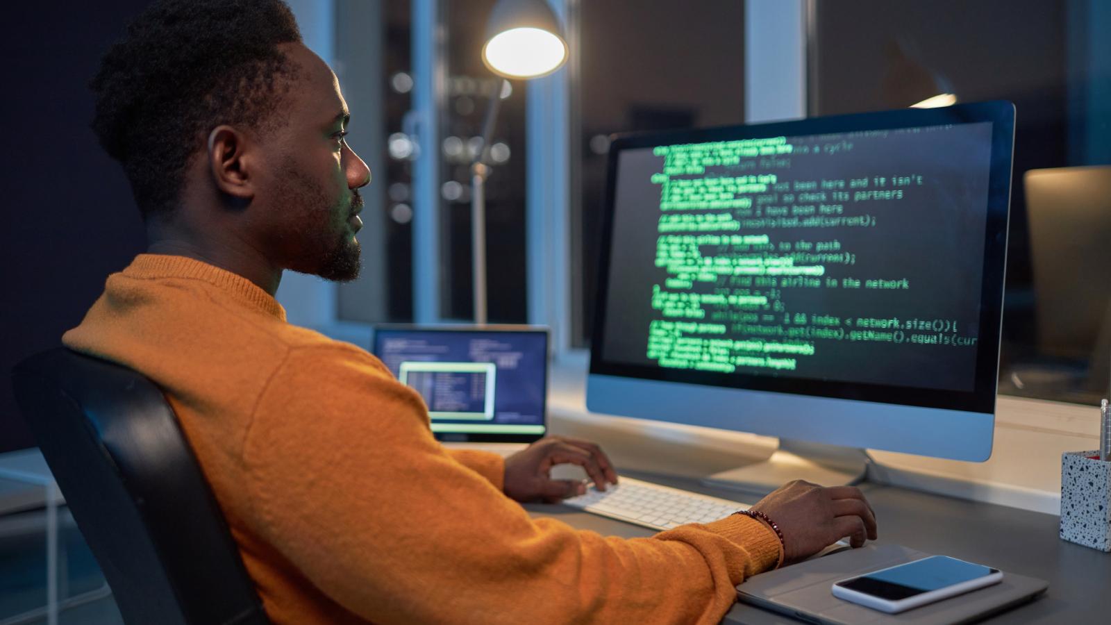 man on a computer