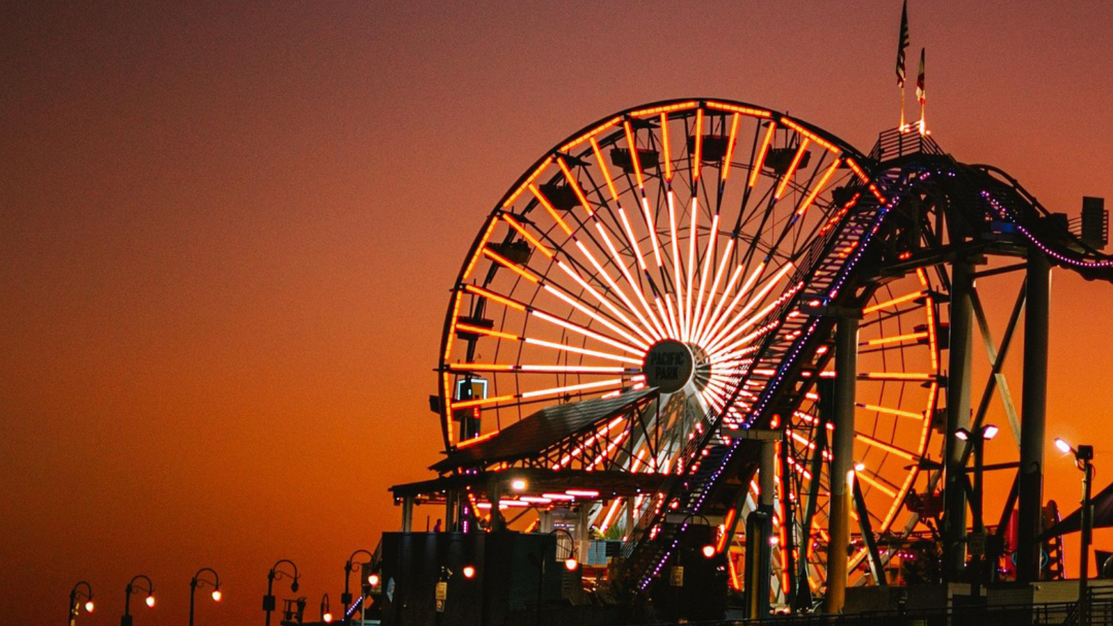 Theme Park Manager Defends Young Cashier After Customer Explodes Over Prices A theme park at sunset