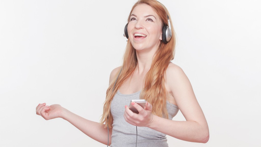 Smiling woman with headphones on