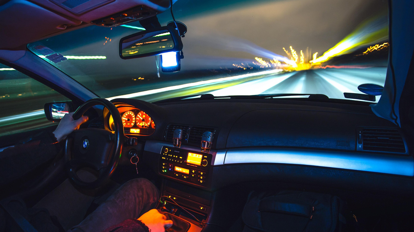 Someone Sped Up to Cut Off Another Car Before a Lane Closure, But They Got an Unexpected Lesson in Patience Intead Timelapse of a car speeding down the road at night