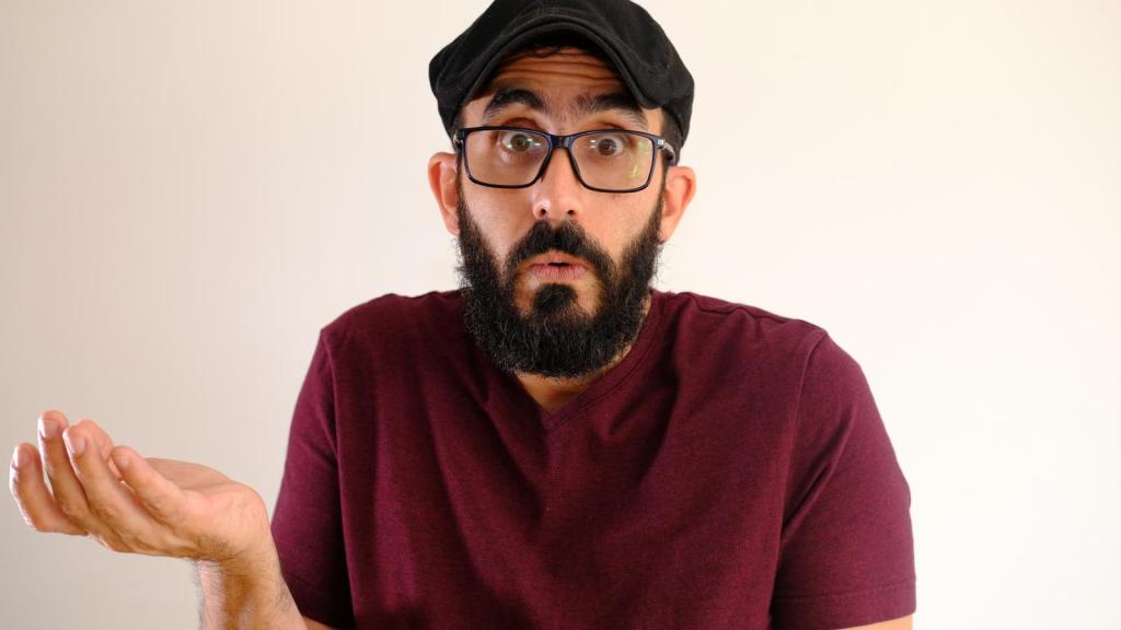 man wearing hat and glasses