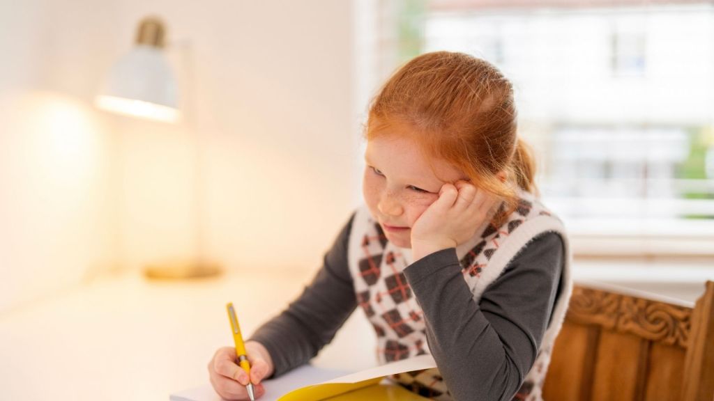 girl struggling to study