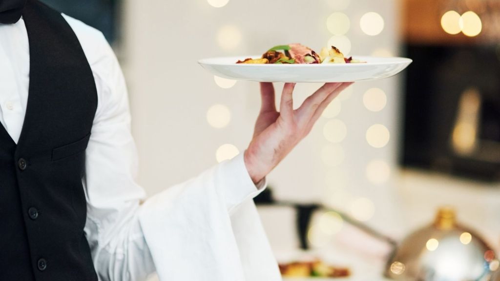 restaurant server with food