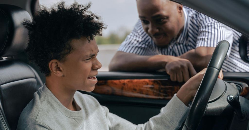 teen boy upset with dad