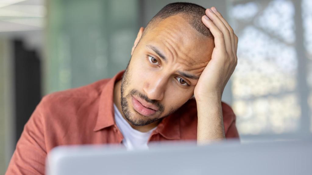 man with an exasperated expression