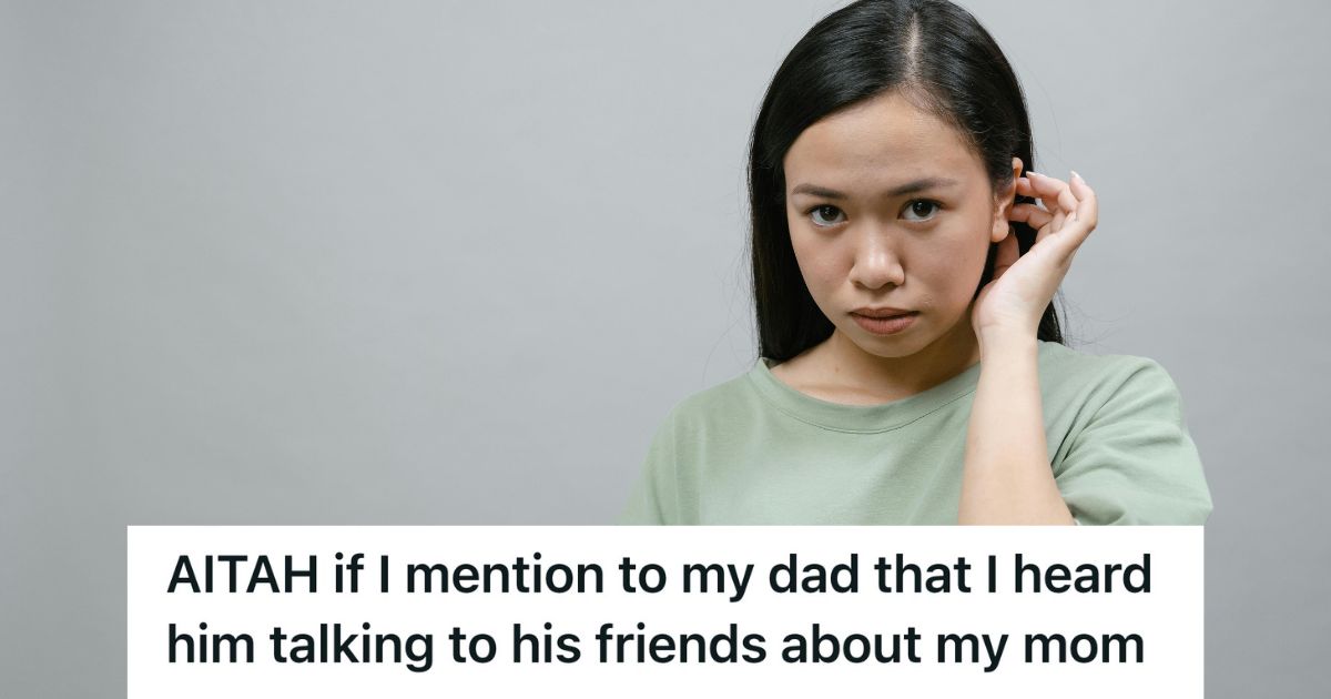 woman cupping hand around her ear