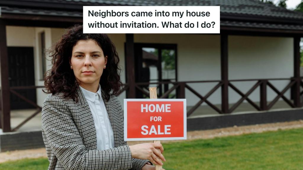 woman holding up a red sign that says home for sale