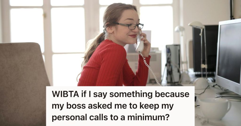 woman in red sweater talking on phone at work