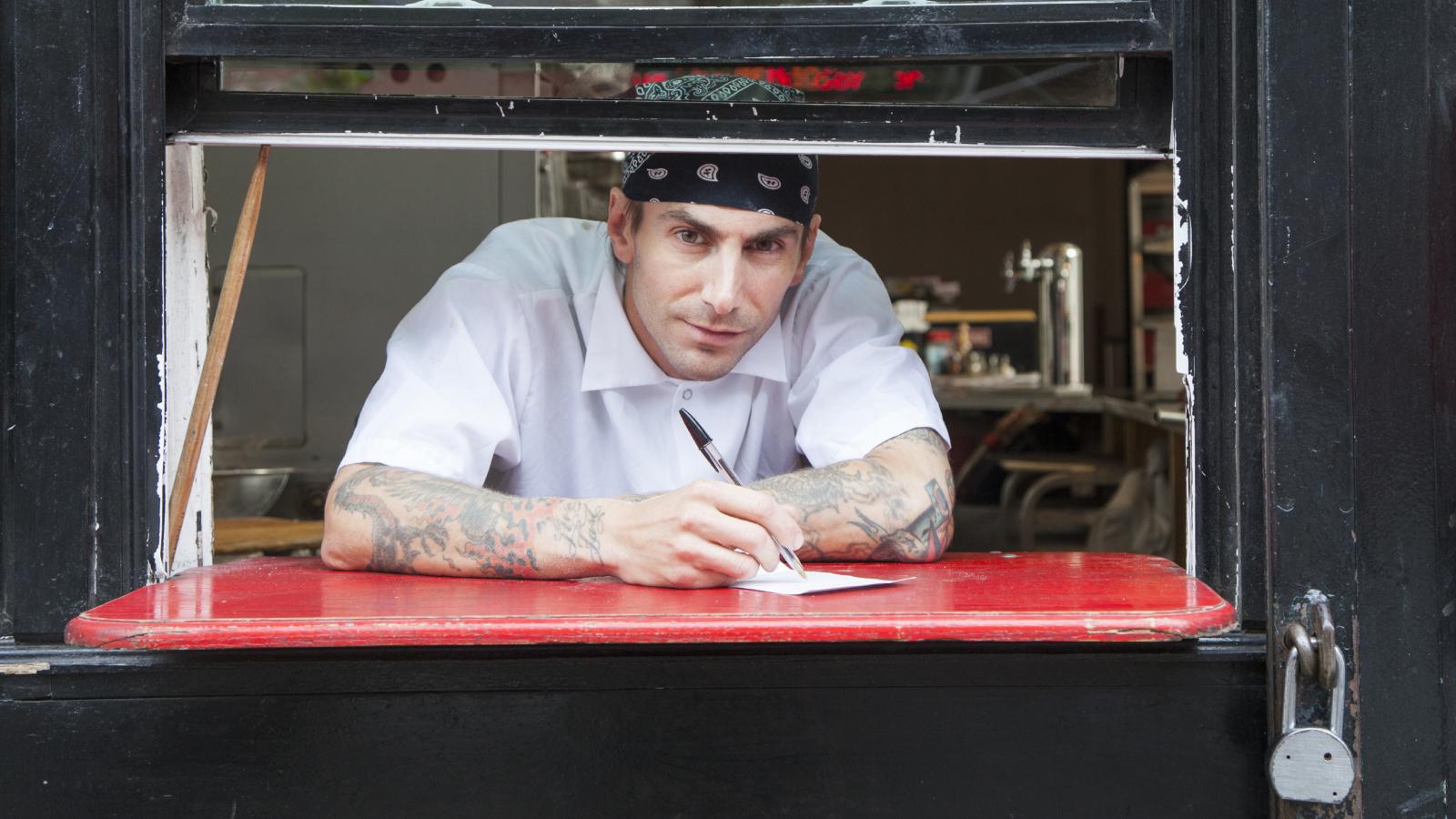 worker in a pizza shop