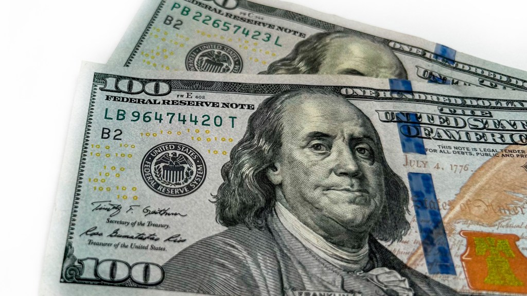 A pair of one hundred dollar bills
