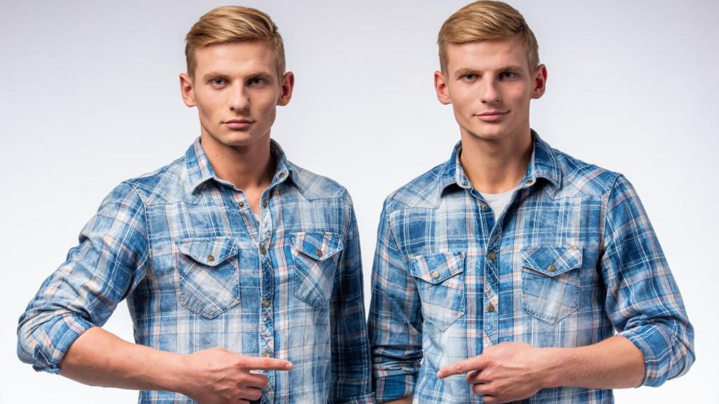 twin men pointing at each other