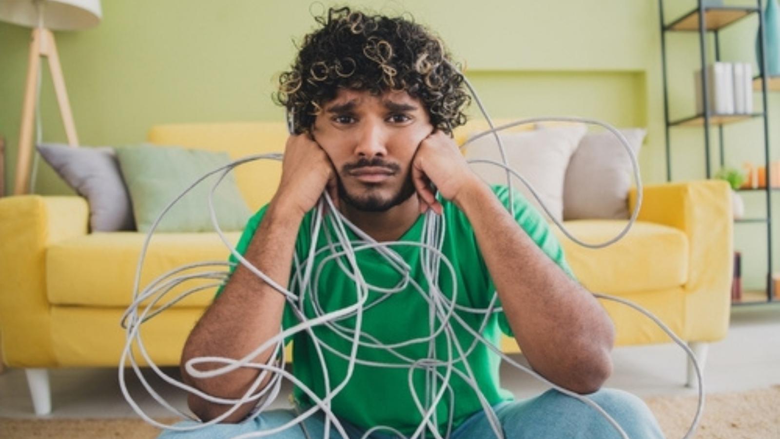 Man with computer cables